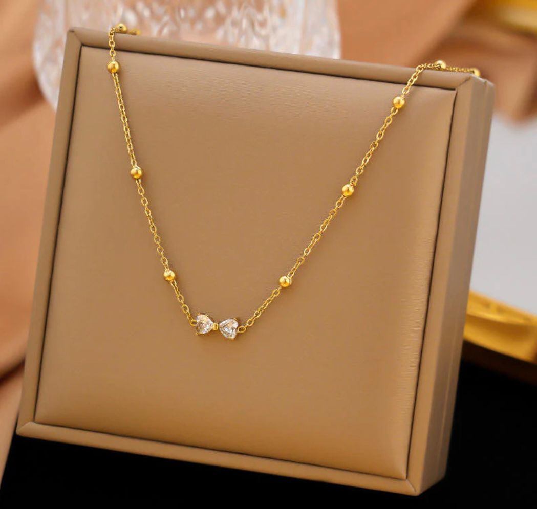 MINIMAL BOW BEADED NECKLACE