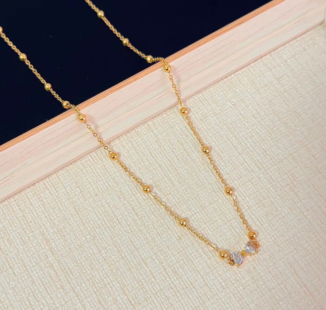 MINIMAL BOW BEADED NECKLACE